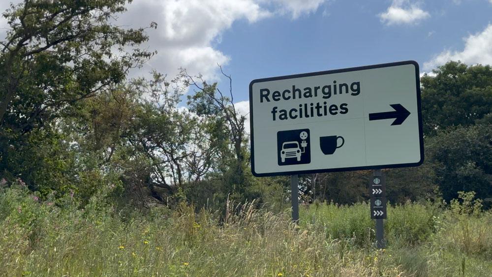 Motorway charging sign
