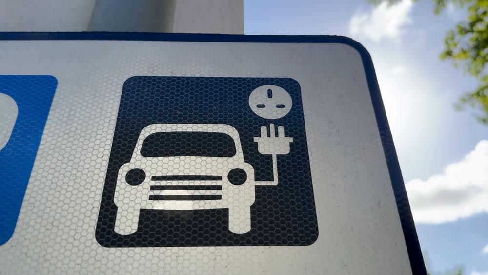 EV charging road sign
